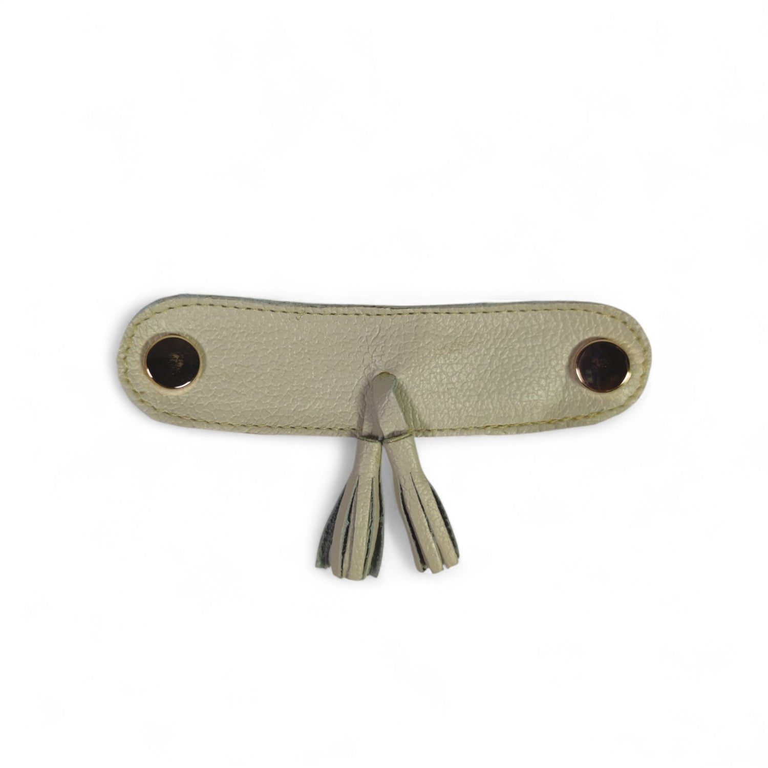 Detalle Borlas cuero