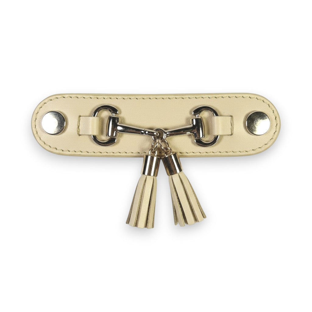 Detalle herraje con borlas cuero